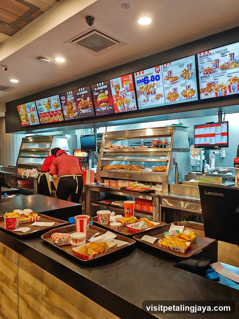 KFC Counter with Menu Boards and Trays of Food