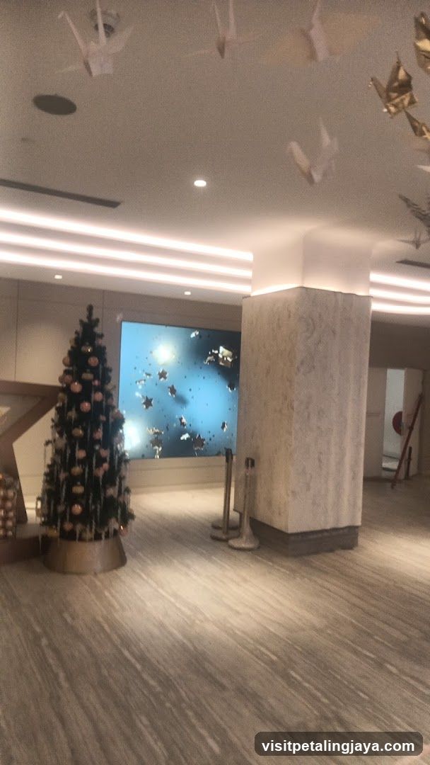 Interior with Christmas Tree and Digital Display