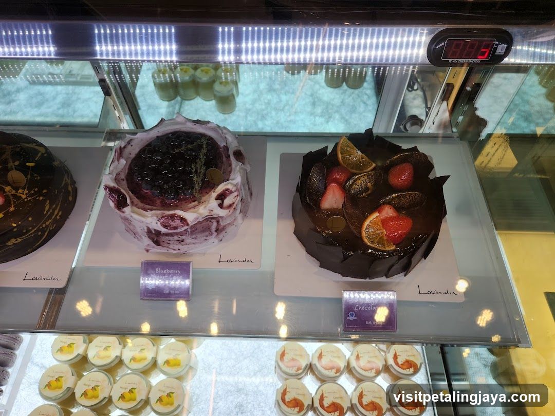 Cakes and Pastries in a Display Case