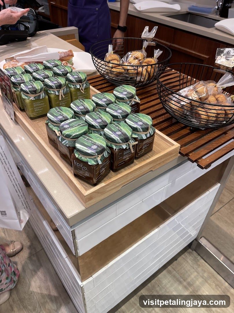 Jars of jam and baked goods on display