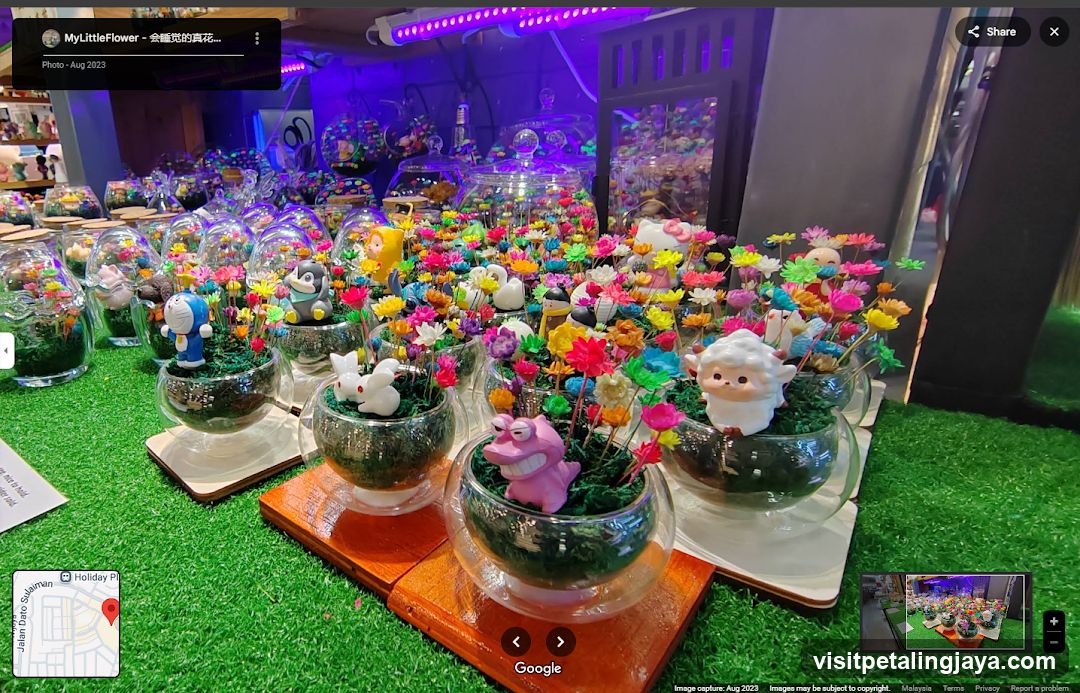 Assortment of Miniature Flower Arrangements with Figurines