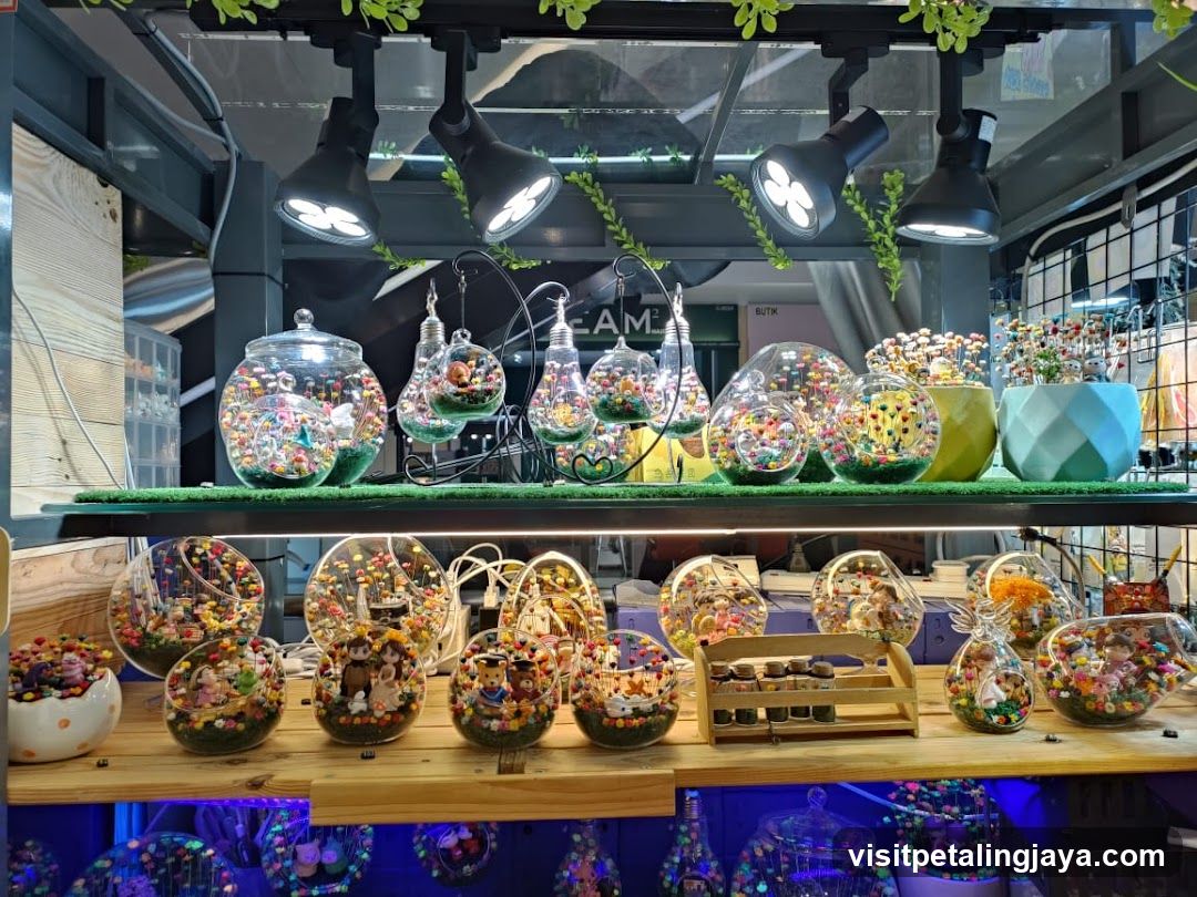 Display of decorative glass orbs and jars