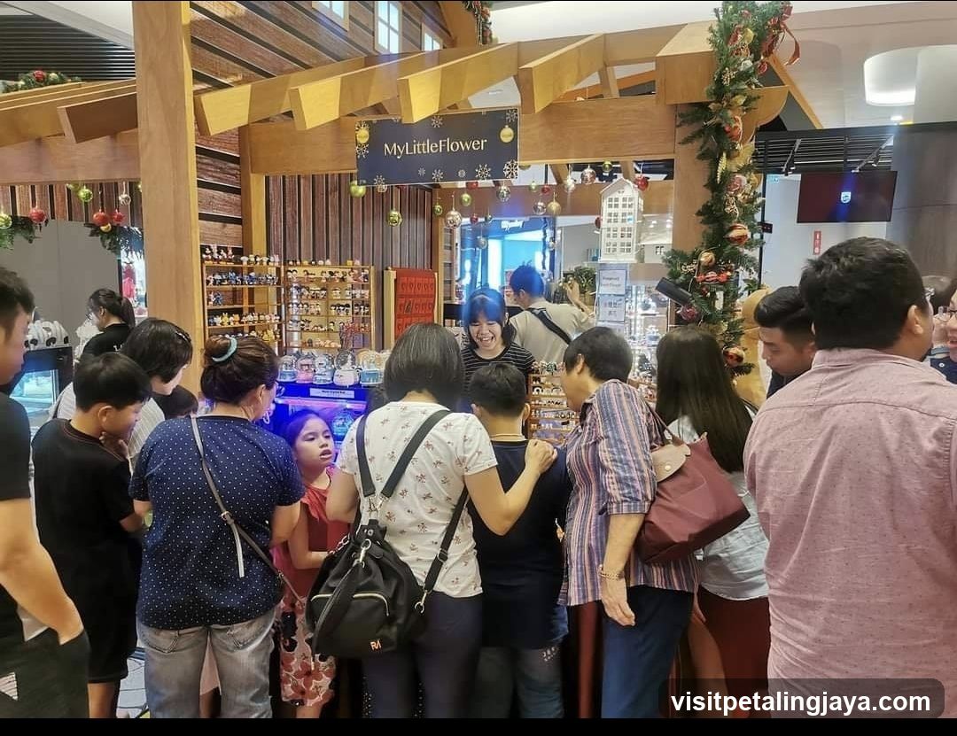 Christmas display with people browsing