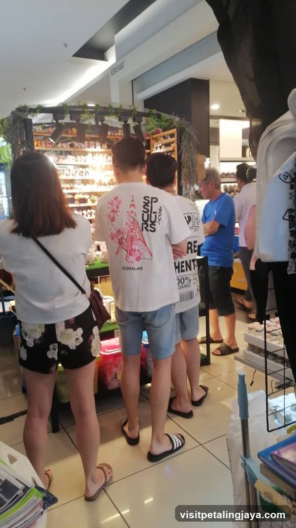 People browsing a store display