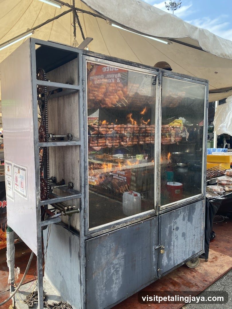 Rotisserie Grill with Meats Cooking