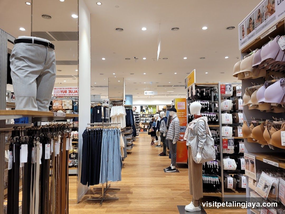 Clothing store interior with mannequins and merchandise