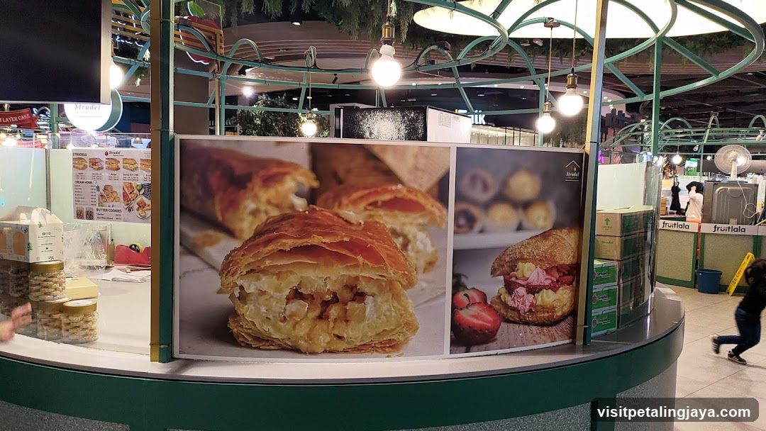 Strudel stand with food images
