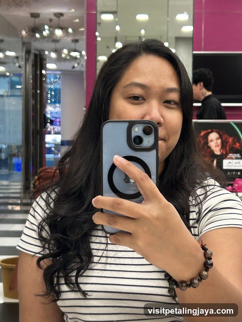 Woman taking a selfie in a salon