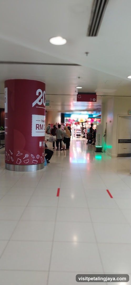 Shopping Mall Interior with Promotional Pillar