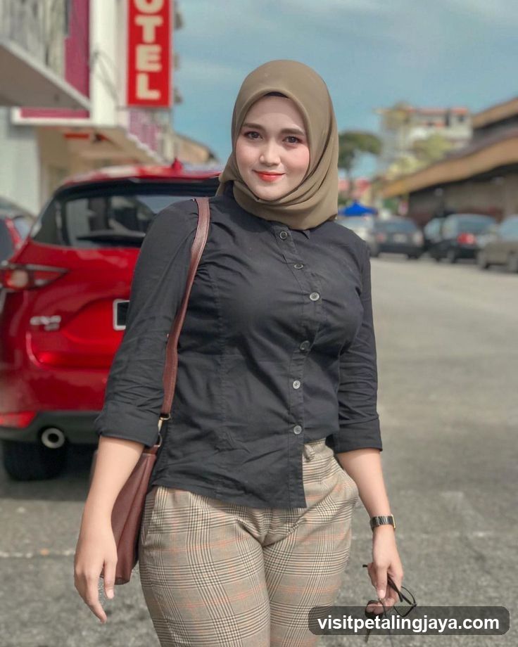 Woman in Hijab and Plaid Pants
