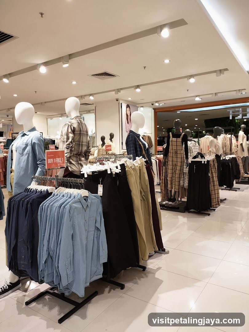 Clothing store interior with mannequins and apparel displays