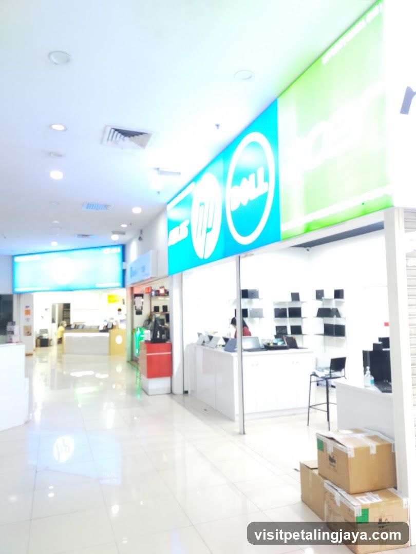 Computer store interior with brand signage