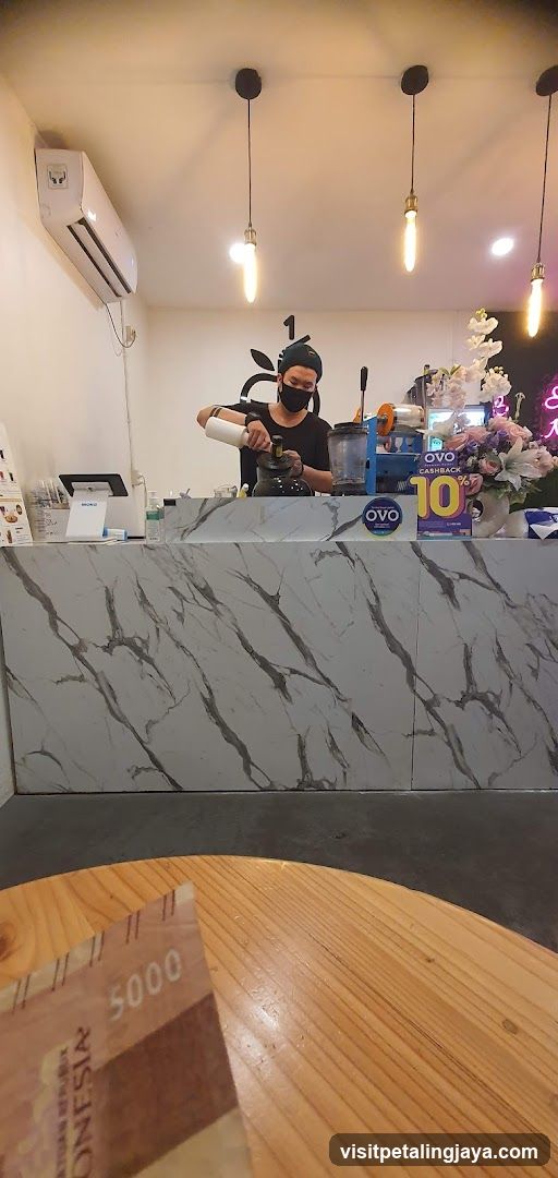 Barista preparing a drink