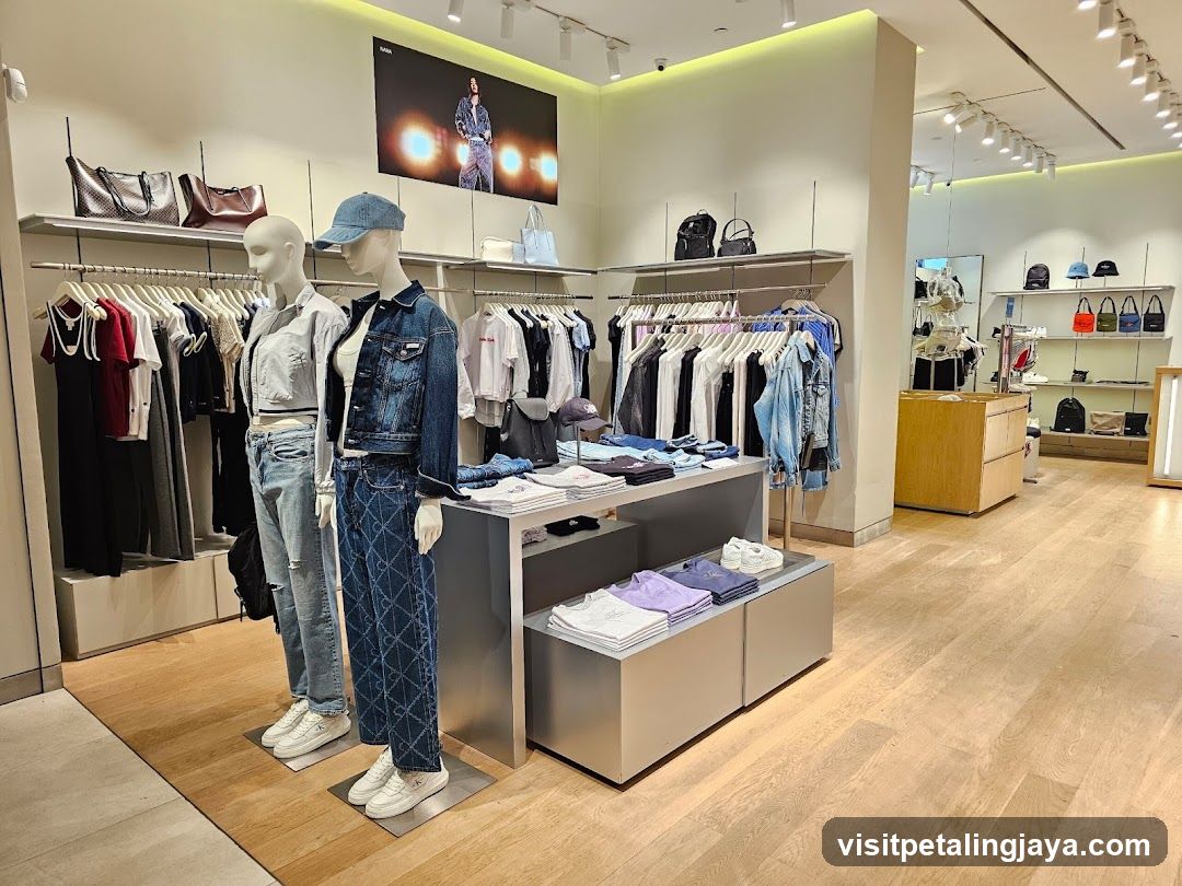 Clothing store interior with mannequins and apparel displays