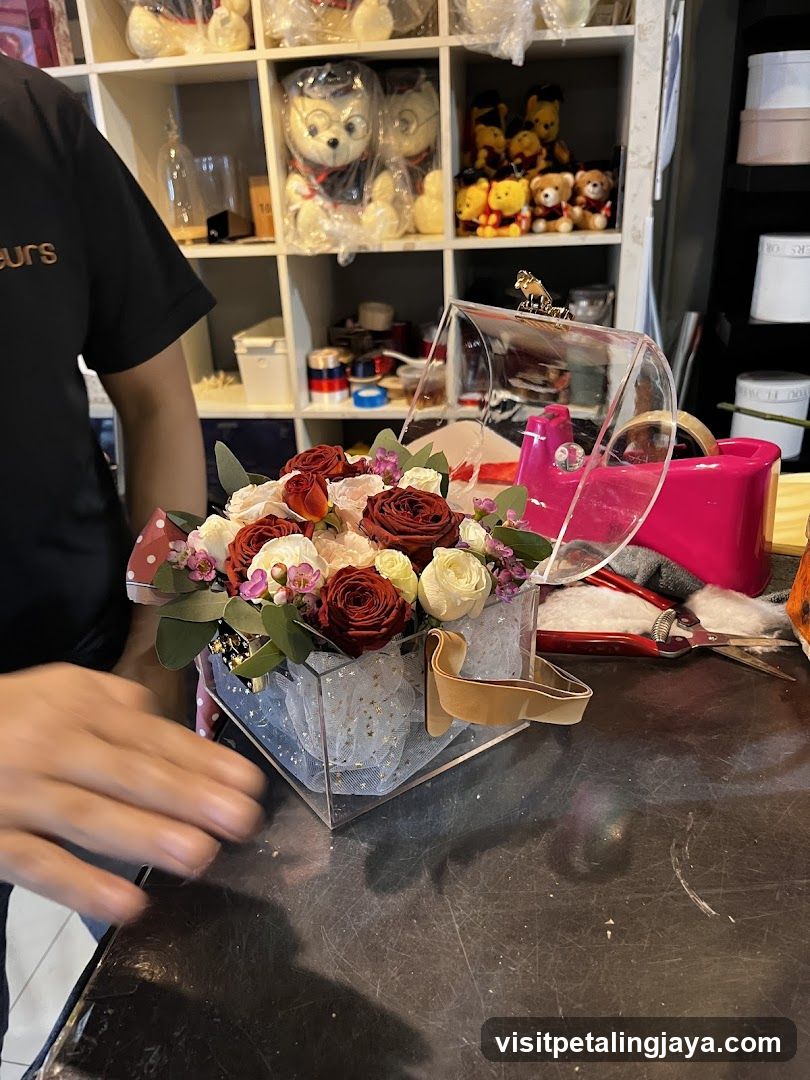 Flower arrangement in a clear box