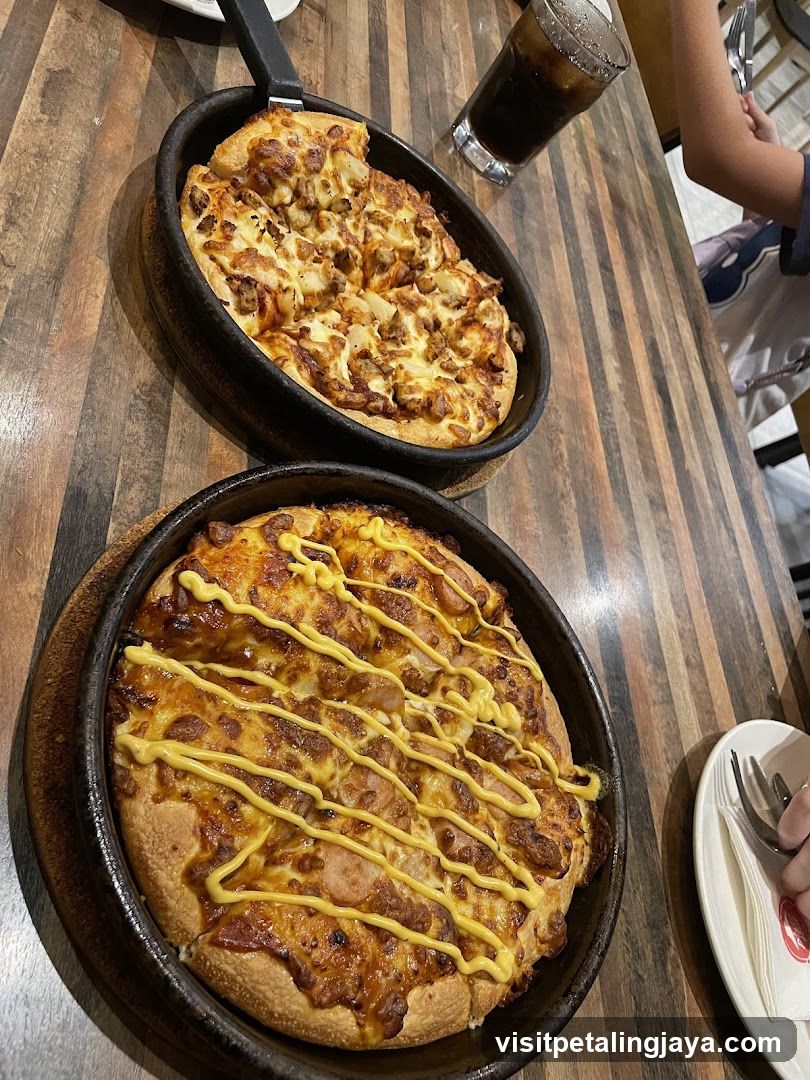 Two Pizzas on a Table