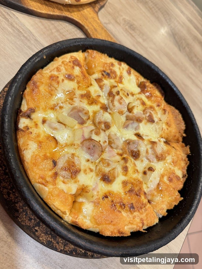 Pizza with Sausage and Pineapple