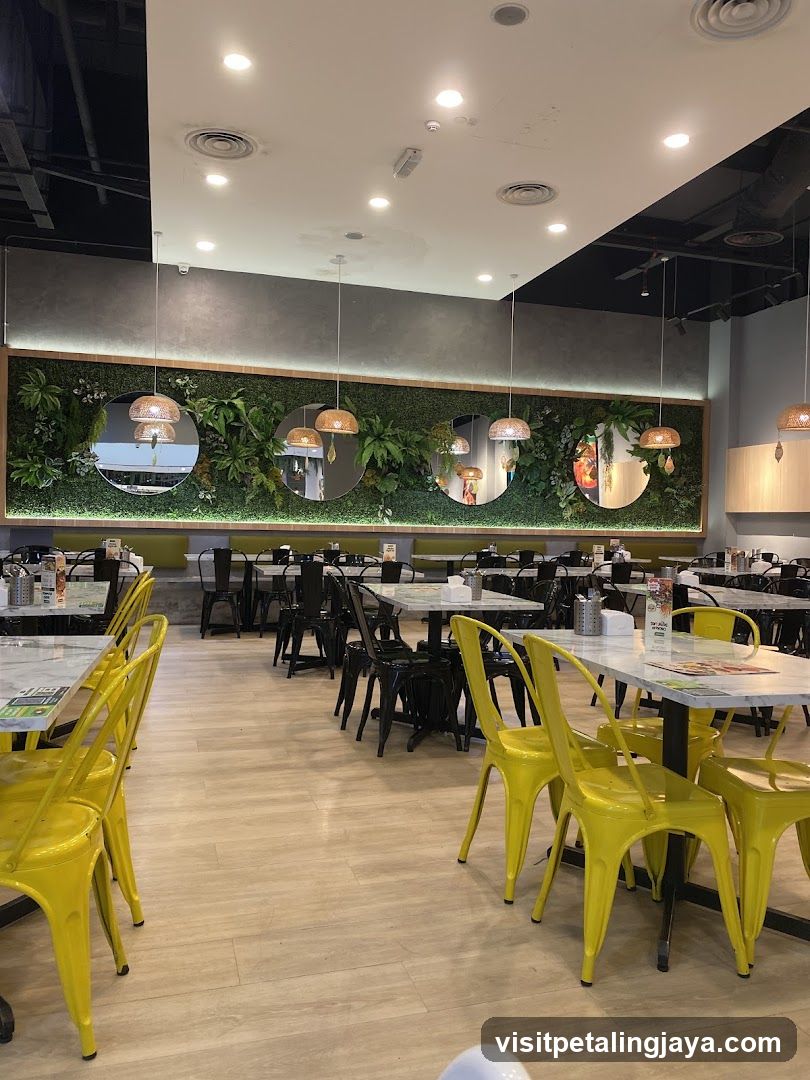 Restaurant Interior with Greenery and Yellow Chairs