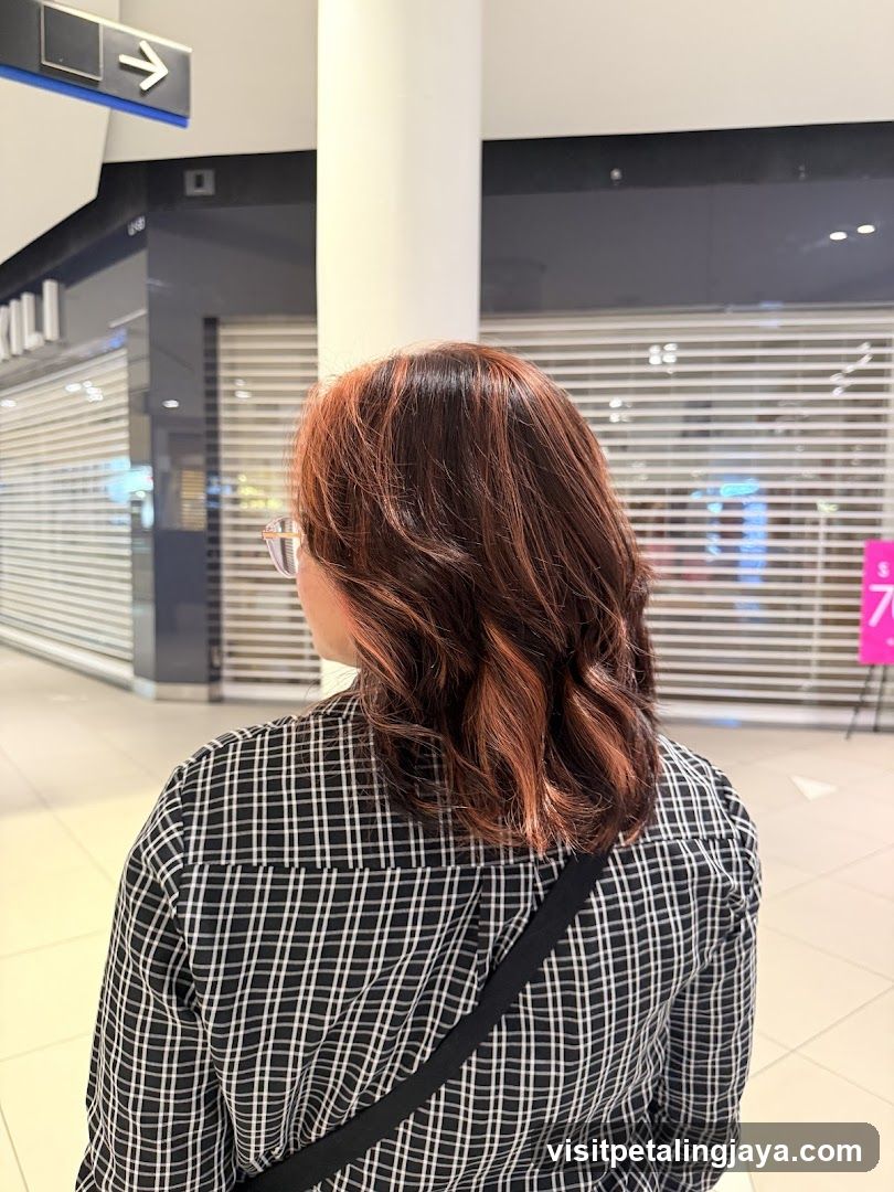 Woman with Reddish-Brown Hair in Mall