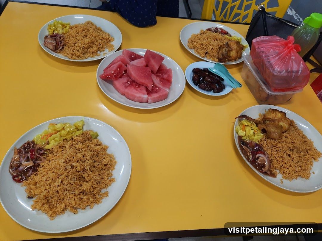 Plates of food on a yellow table