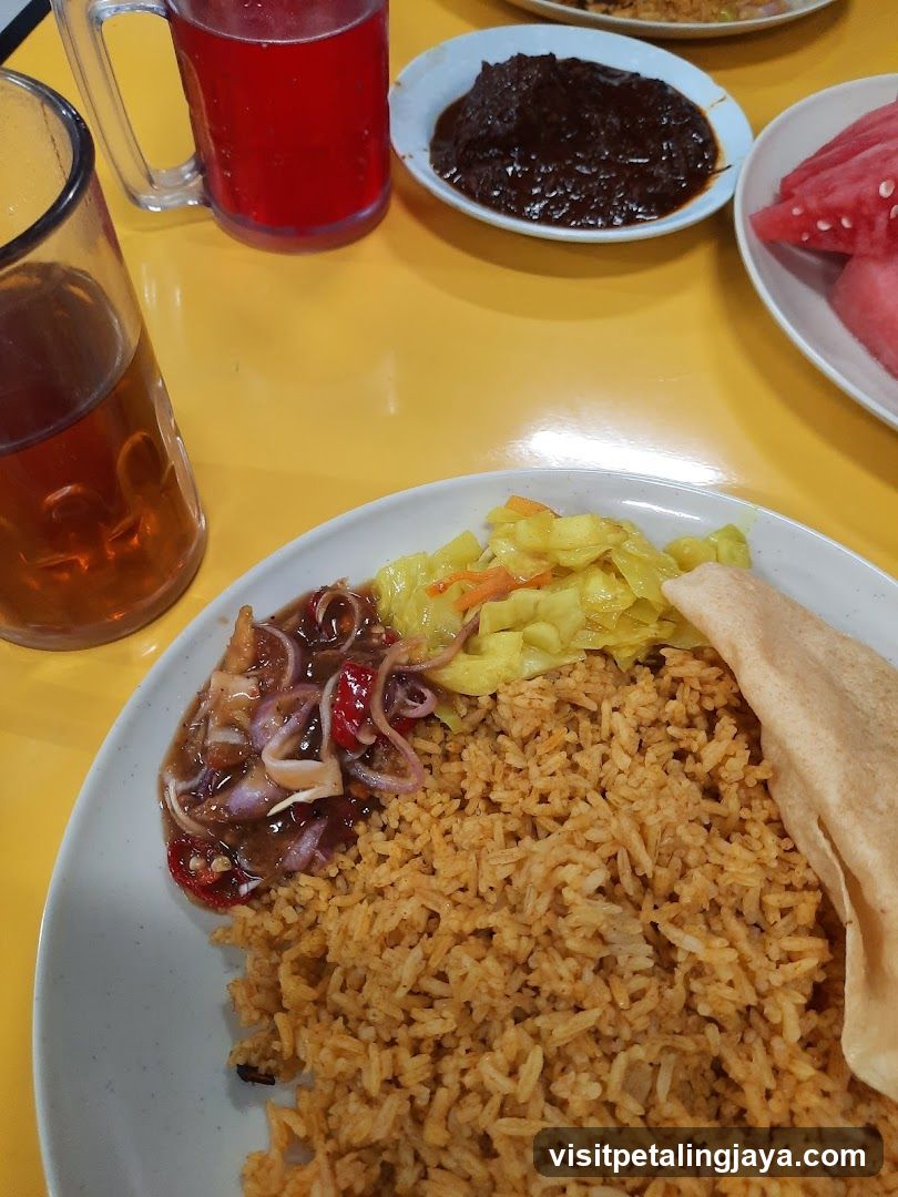 Rice dish with side dishes and drinks