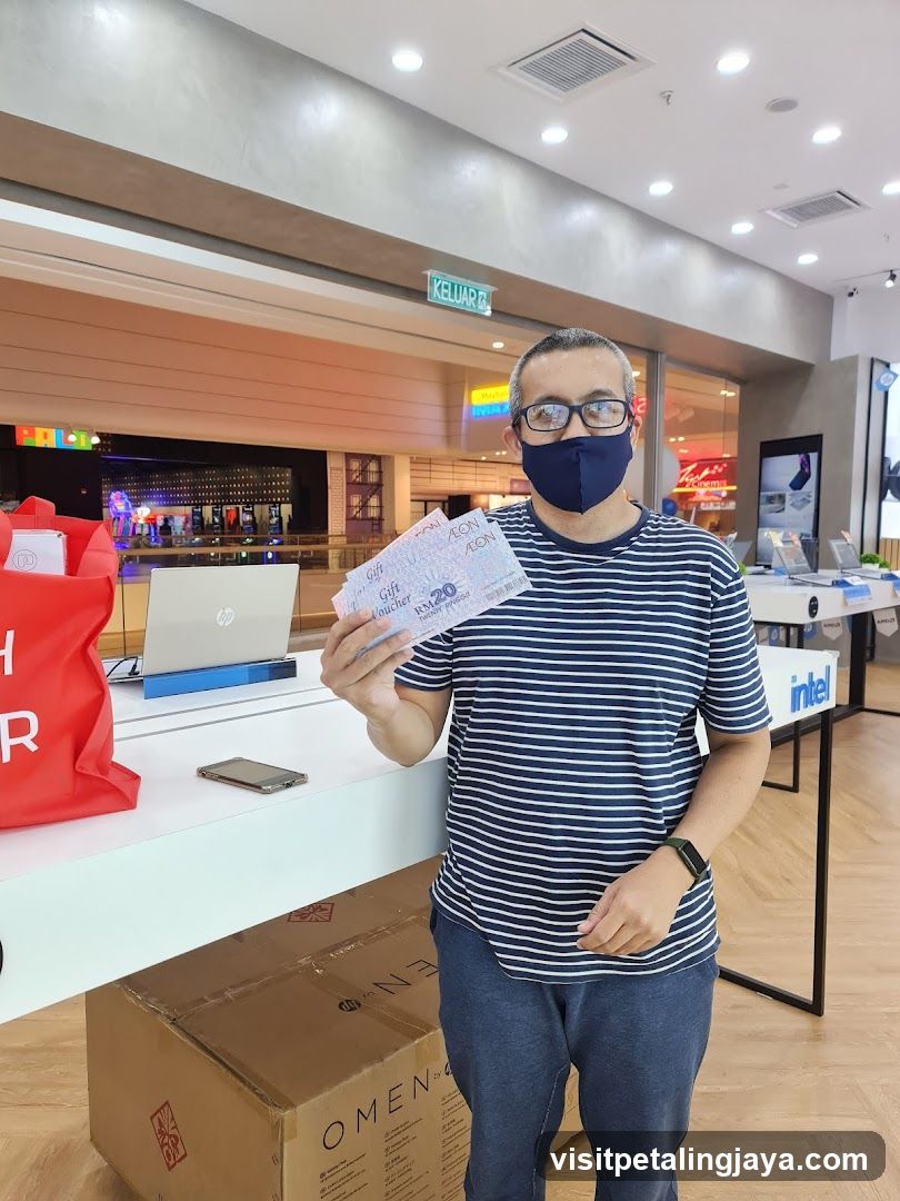 Man Holding Gift Vouchers