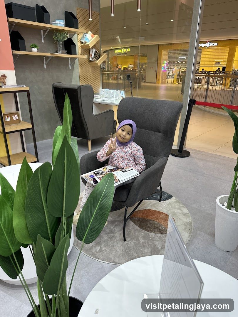 Girl reading in a lounge area