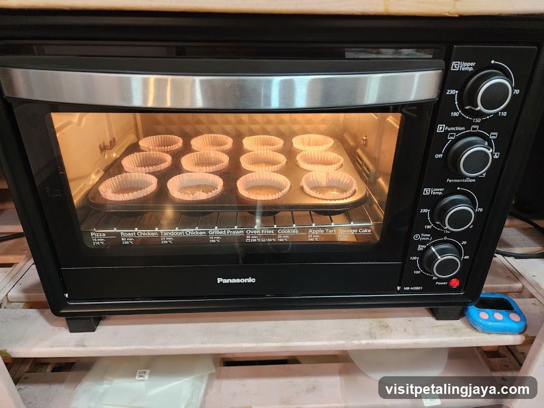 Oven with Muffins Baking