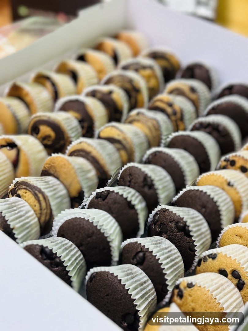Assortment of Mini Muffins and Pastries