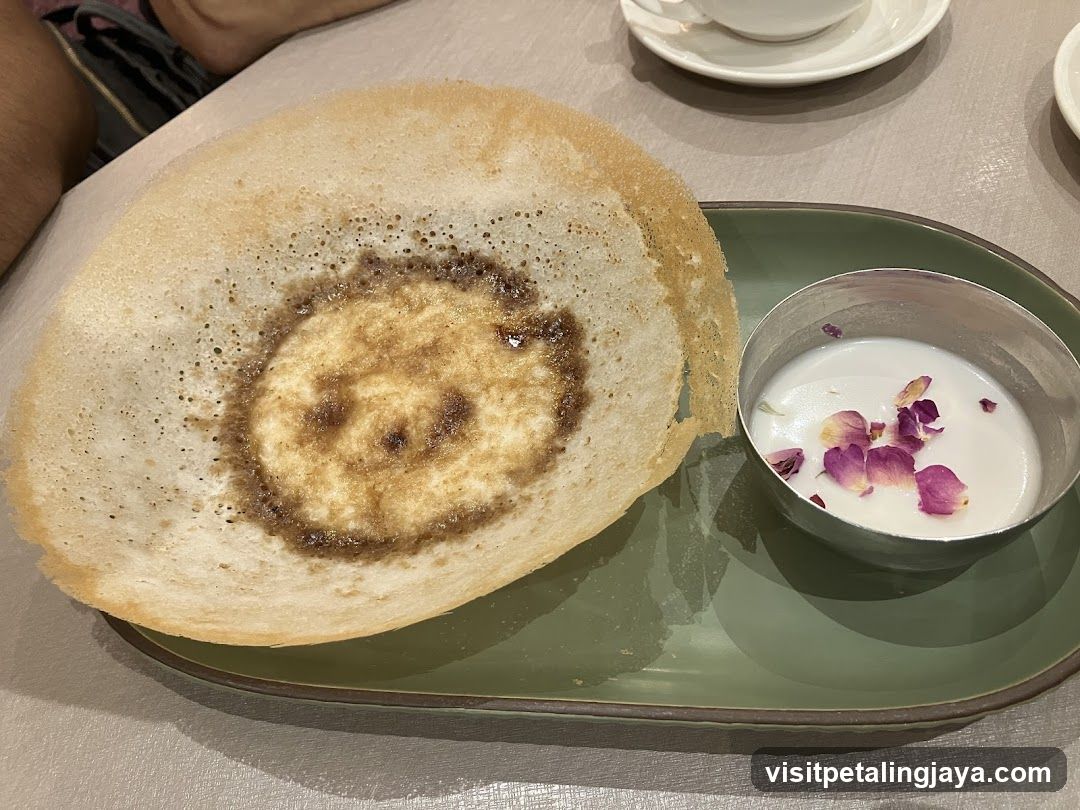 Appam with Coconut Milk and Rose Petals