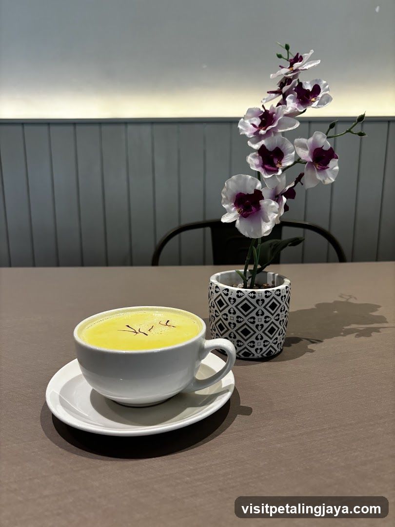 Golden Latte with Saffron and Orchid Decoration