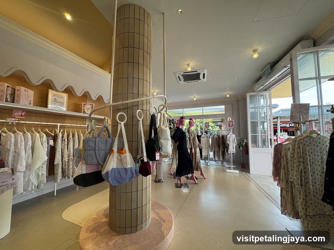 Clothing store interior with mannequins and apparel