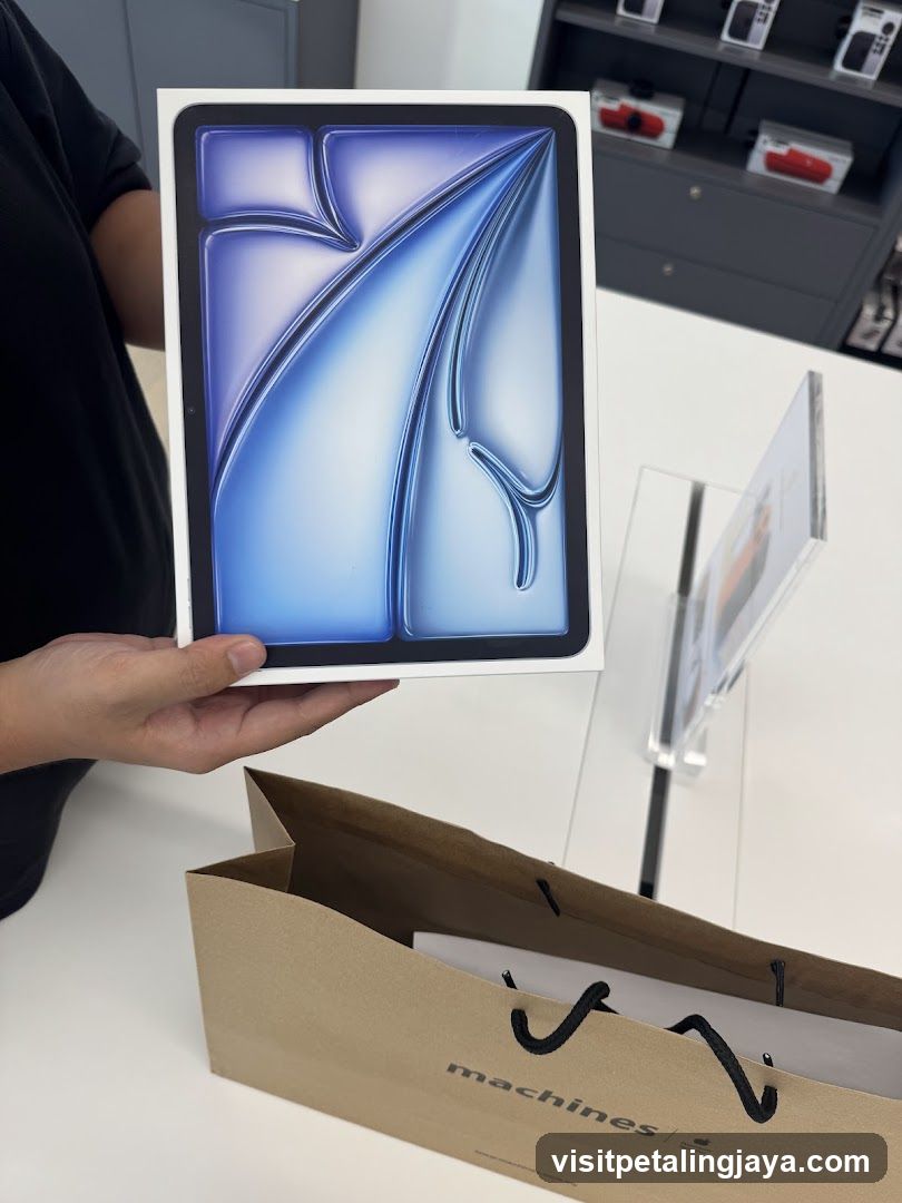 Person holding a tablet box