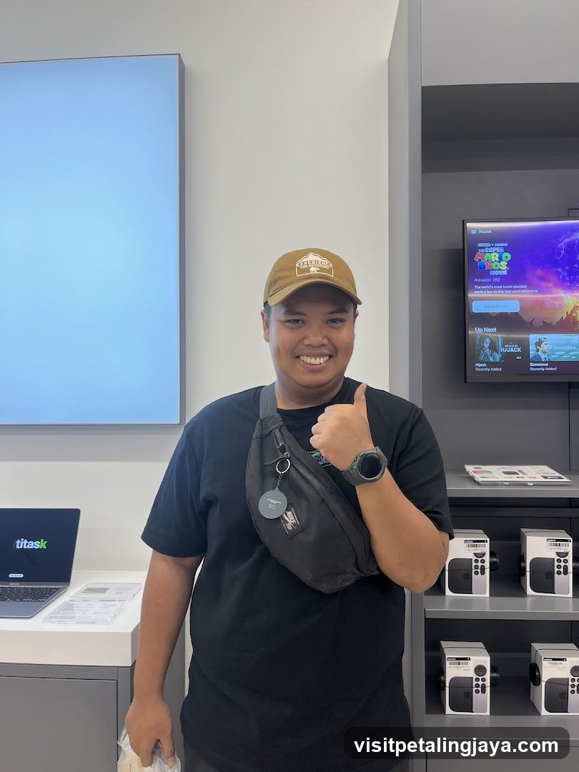 Man giving a thumbs up in a store