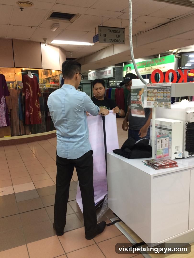 People setting up a display