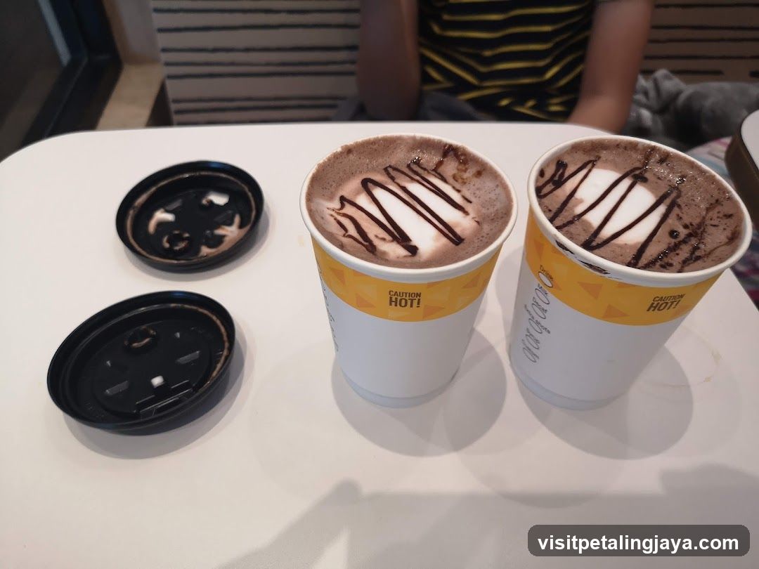 Two hot chocolates with latte art
