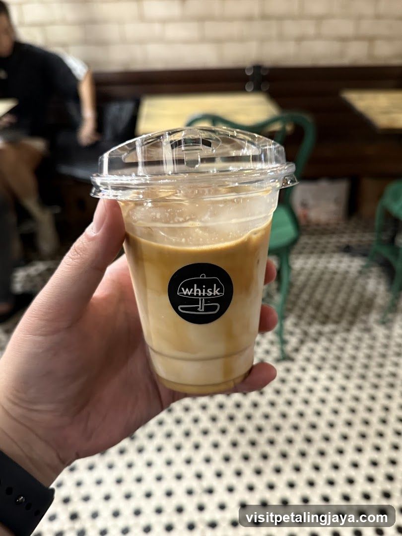 Iced Coffee with Whisk Logo