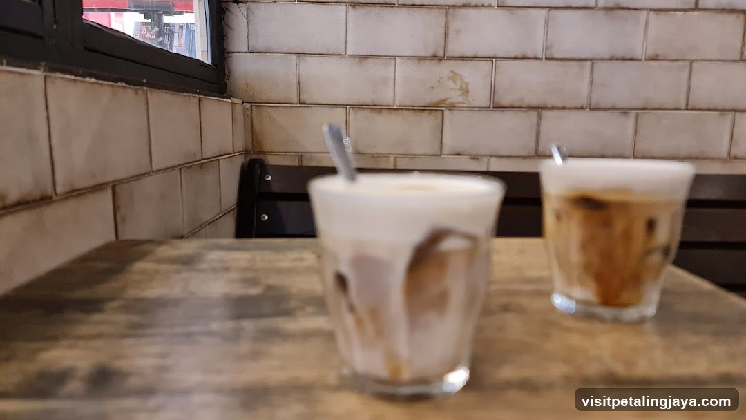 Two iced coffees on a table