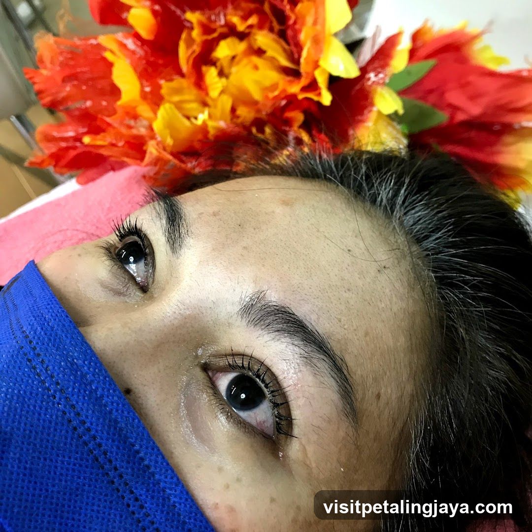 Close-up of a person's eyes with dramatic eyelashes