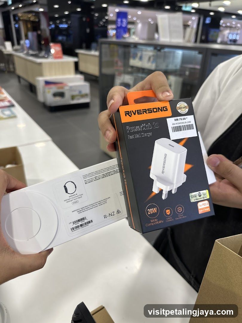 Person holding electronic accessories