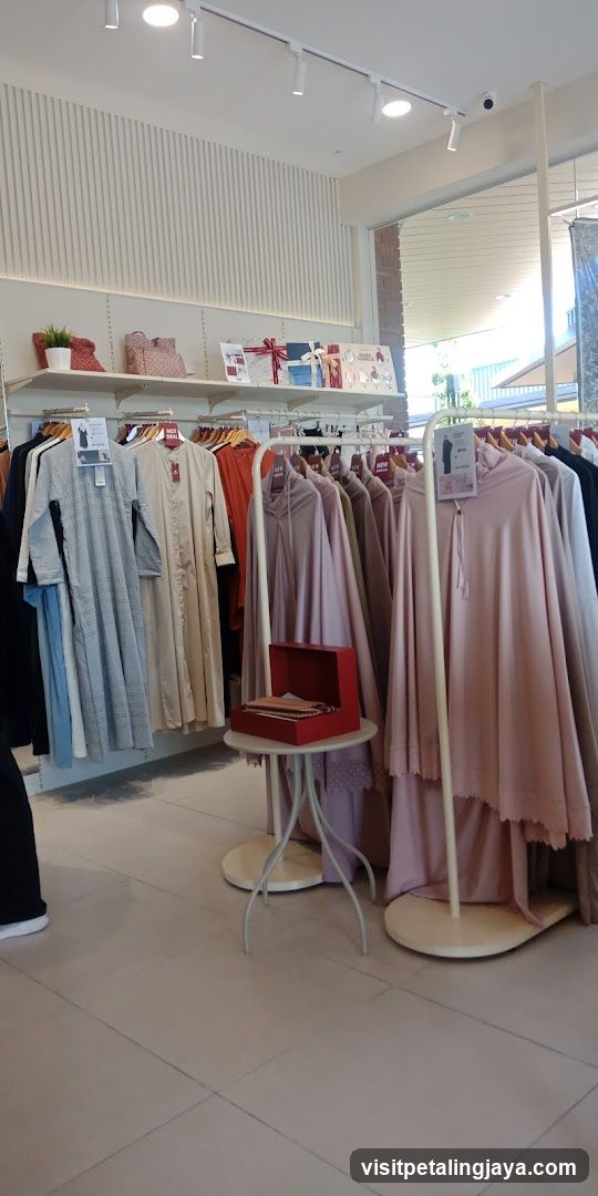 Clothing store interior with dresses and accessories