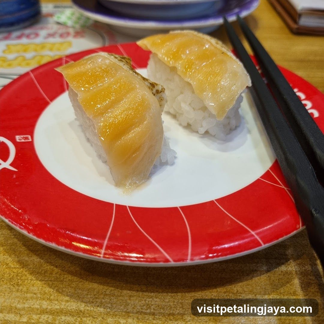 Two pieces of sushi on a plate