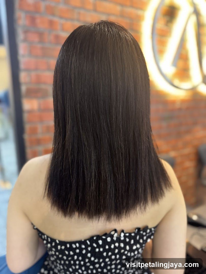 Woman with freshly cut dark hair
