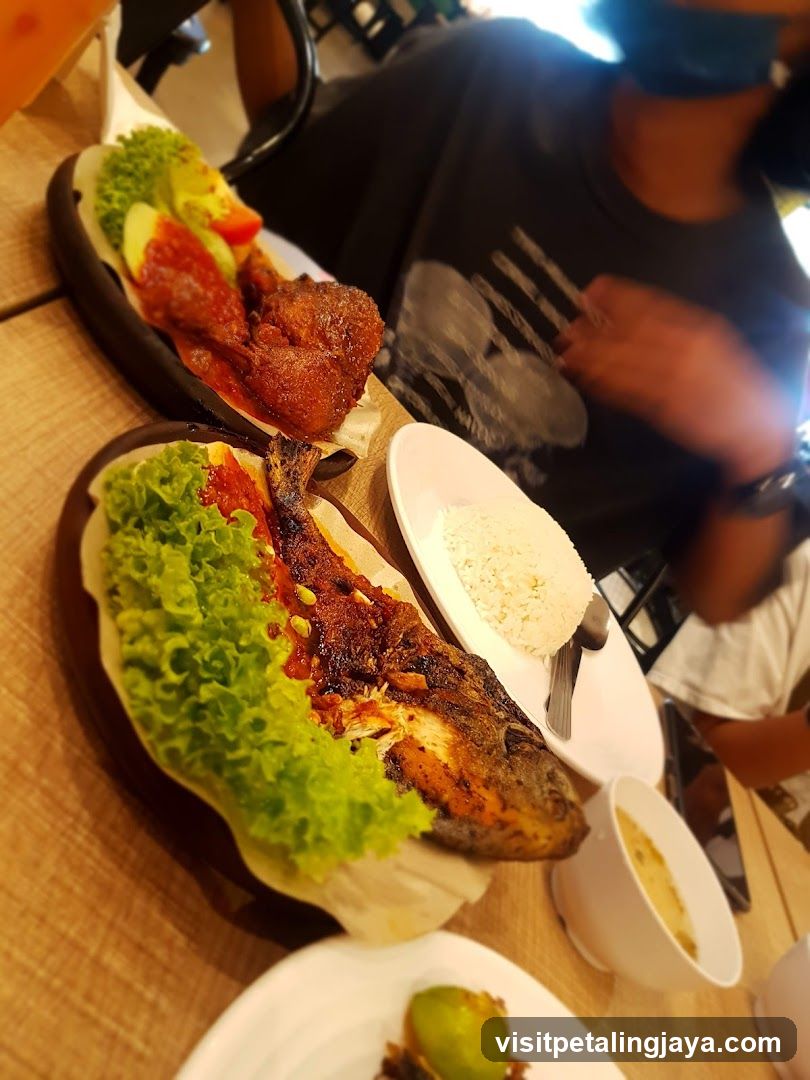 Grilled Fish and Fried Chicken Meal