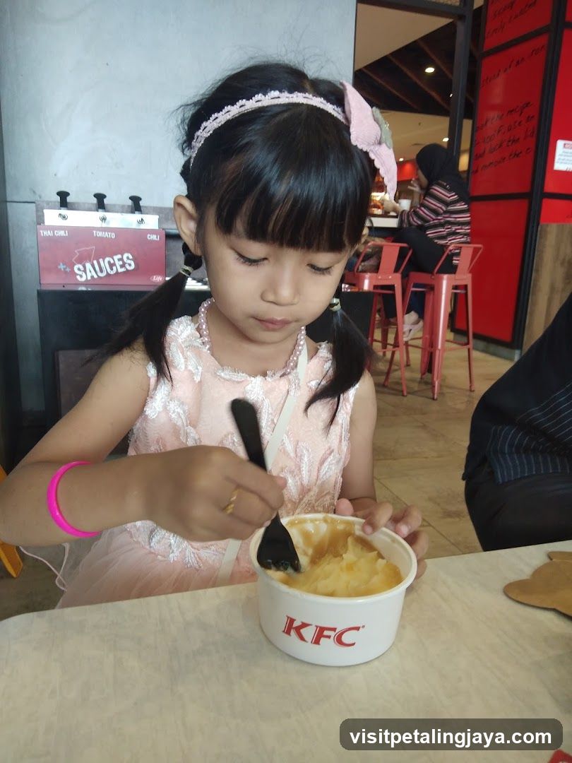 Girl Eating Mashed Potatoes