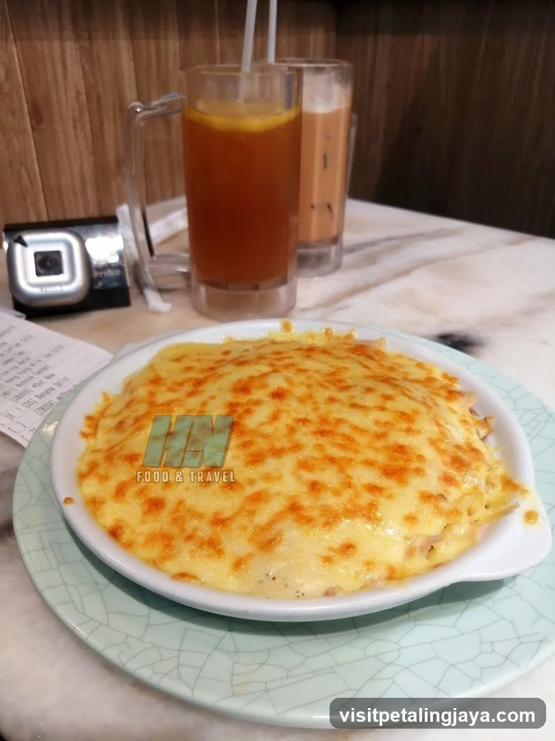 Baked Dish with Cheese and Drinks