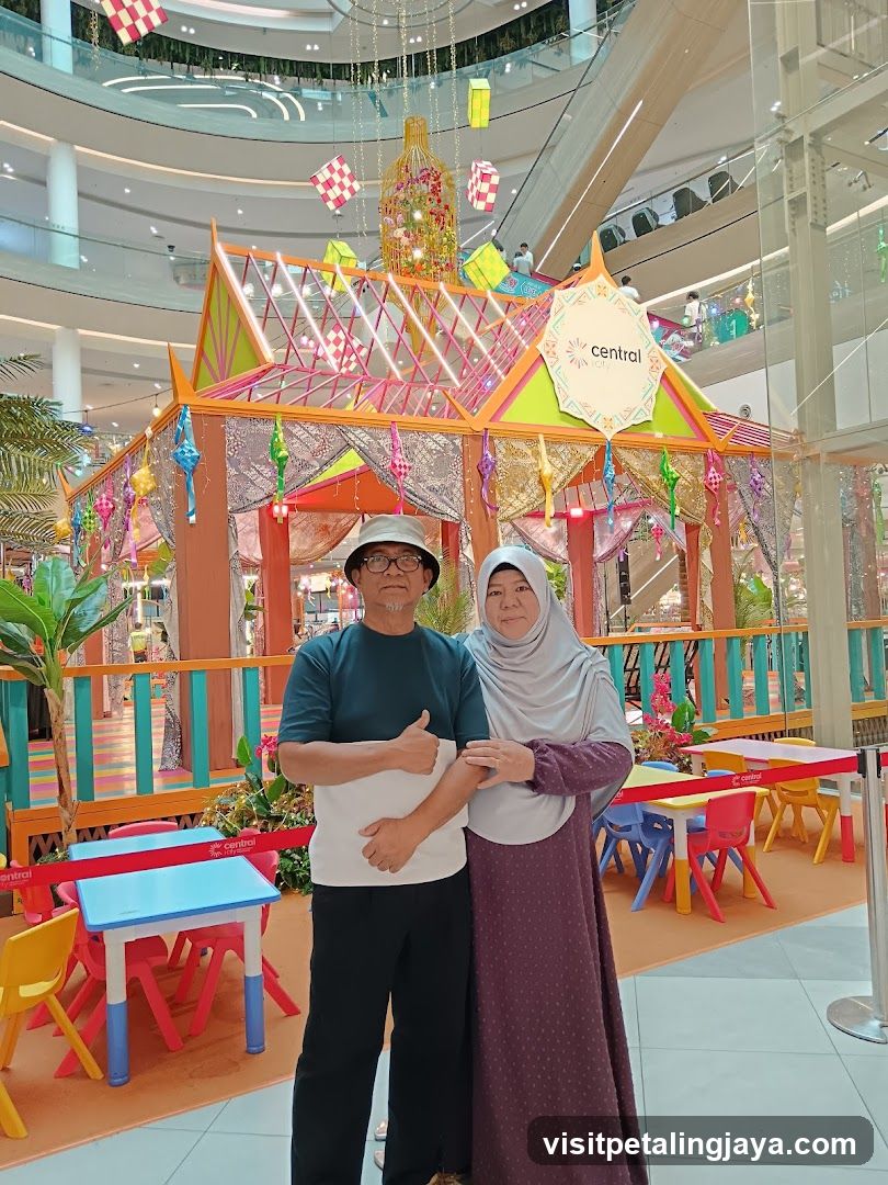 Couple Posing in Festive Mall Display