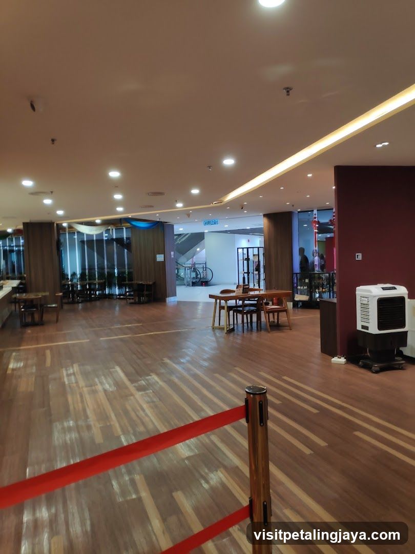 Indoor seating area with wooden tables and chairs