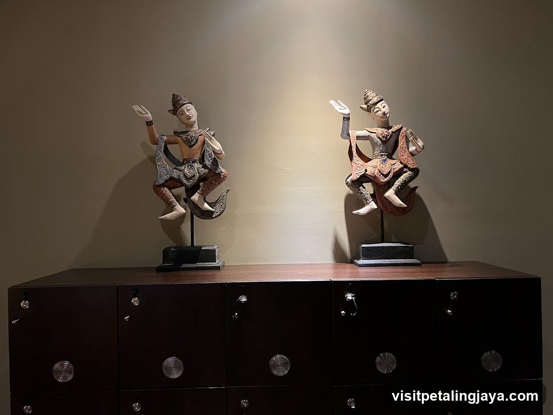 Two Thai Dancer Statues on Lockers