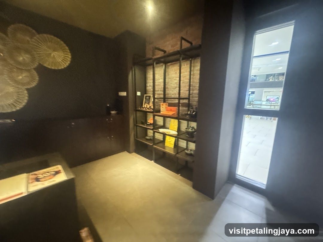 Interior of a shop with display shelves and a window